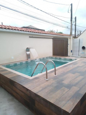 Casa espaçosa com Piscina e Churrasqueira 2 dorm